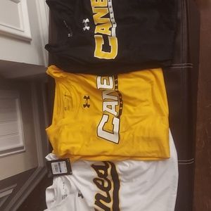 Under Armour Athletic Jersey w/ Canes logo.